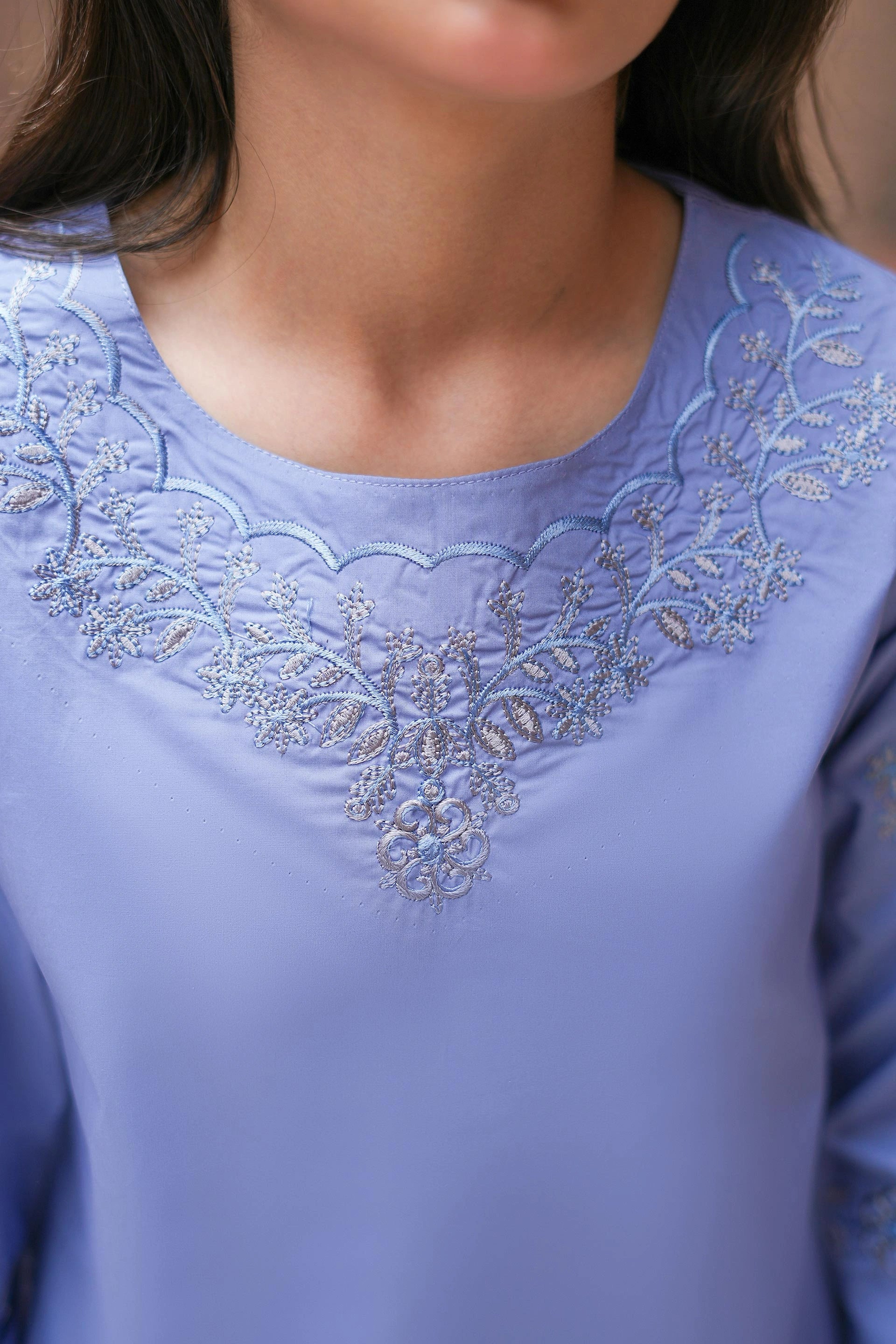 Girl wearing Ayla periwinkle blue embroidered cotton 2-piece ready-to-wear outfit